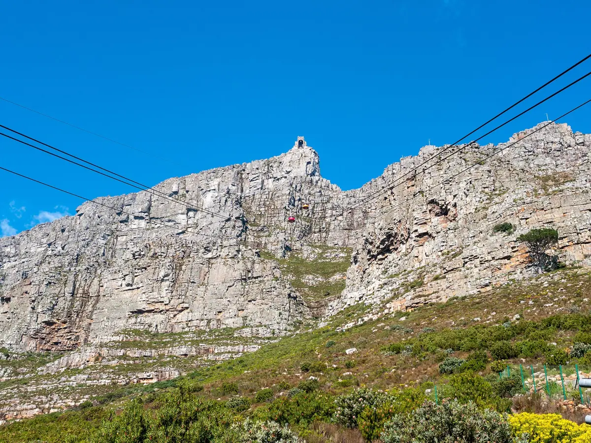 Cableway cables in front of the cliffs